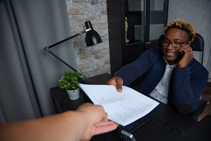 legal assistant training grad submitting documents