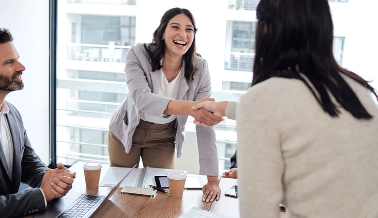A handshake during a business meeting.