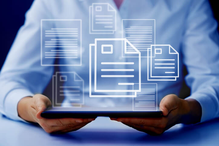 A career training graduate using a record management software program