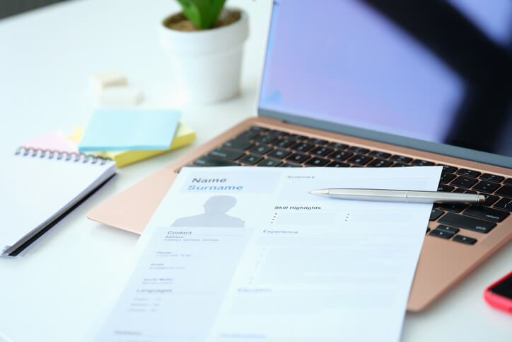 A career college graduate editing their resume