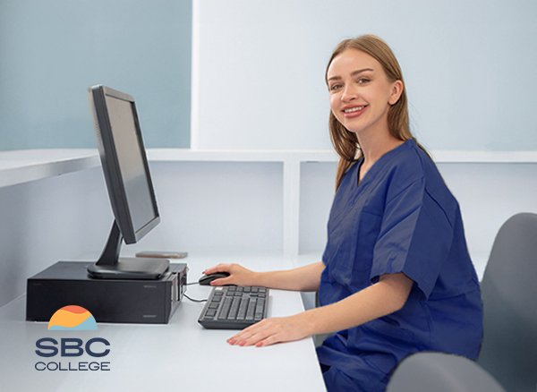 A medical office administrator checking paperwork at a medical office.