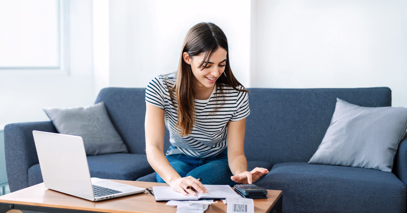 A student filing her tax returns from her home.