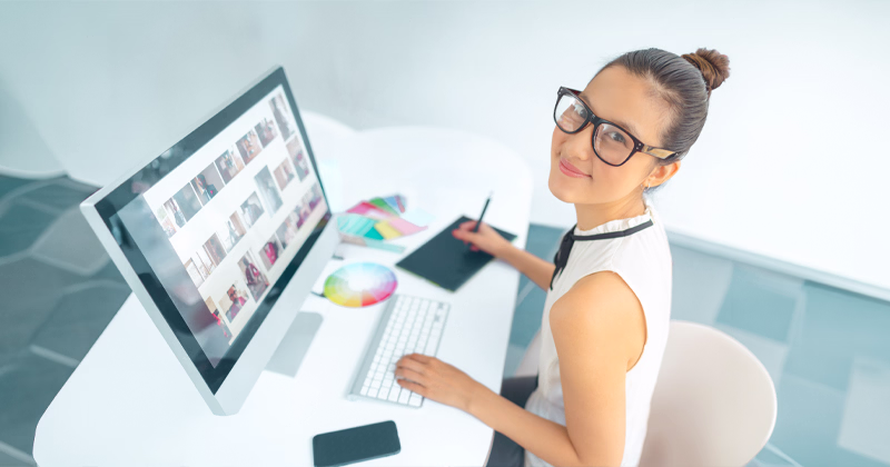 A graphic design professional at her workplace.