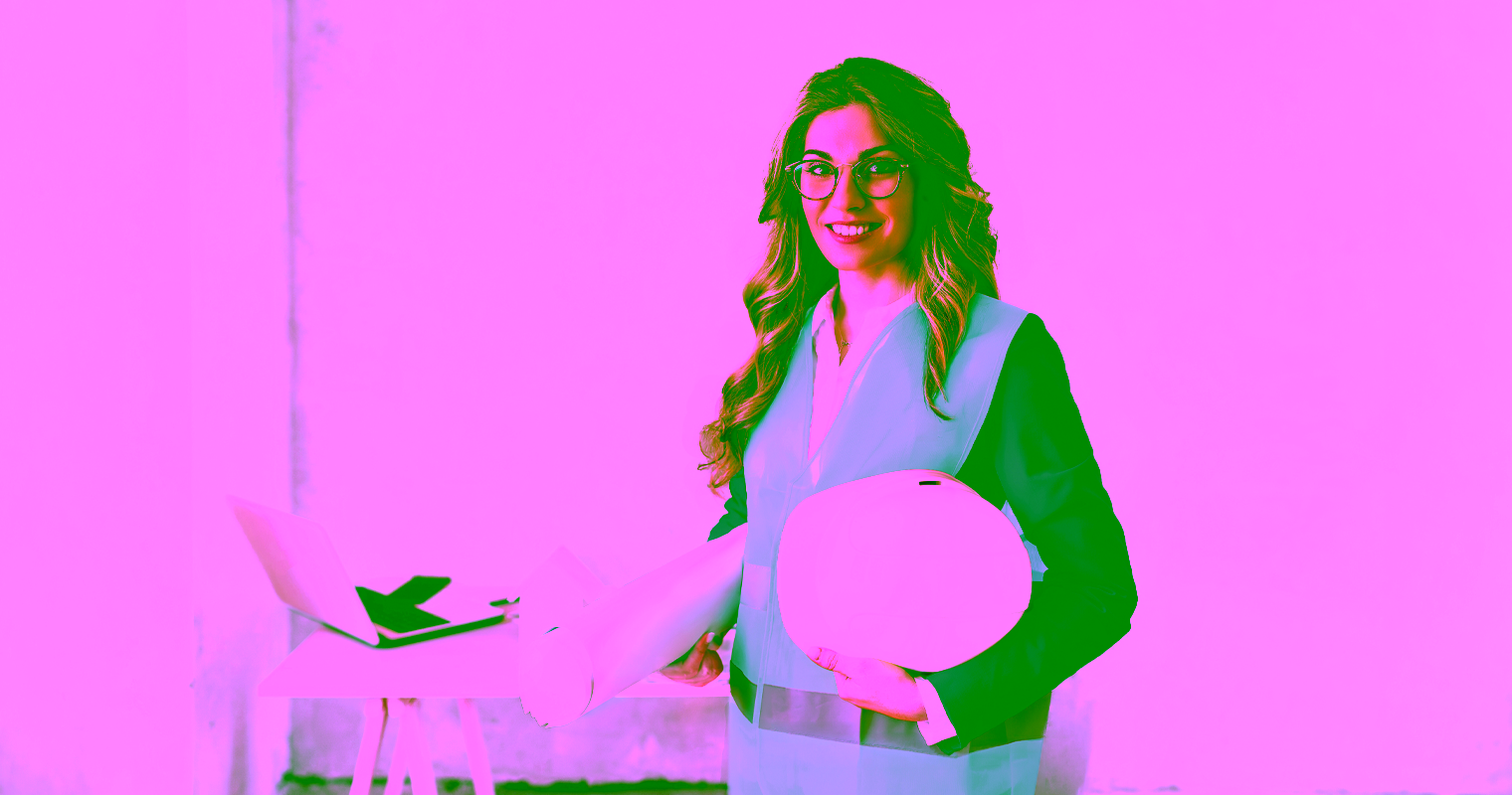 A female Mining Industry Business Specialist in an office setting.
