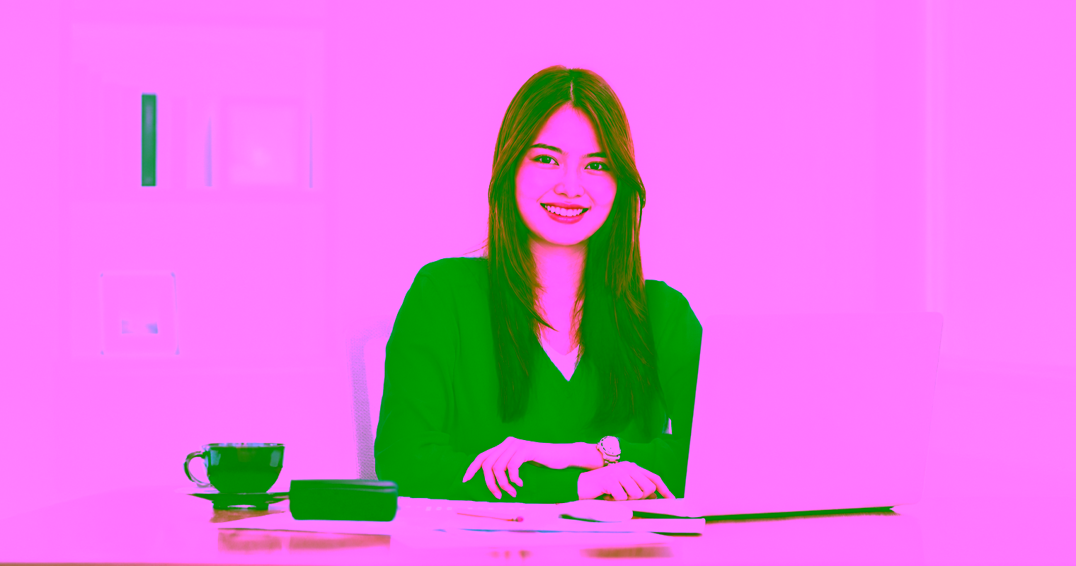 An accounting and payroll administrator works at her desk.