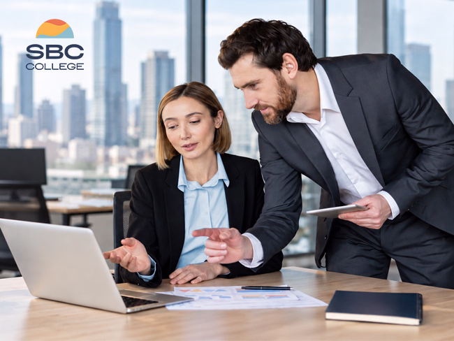 Two accounting and payroll administration professionals discuss employee compensation and benefits.